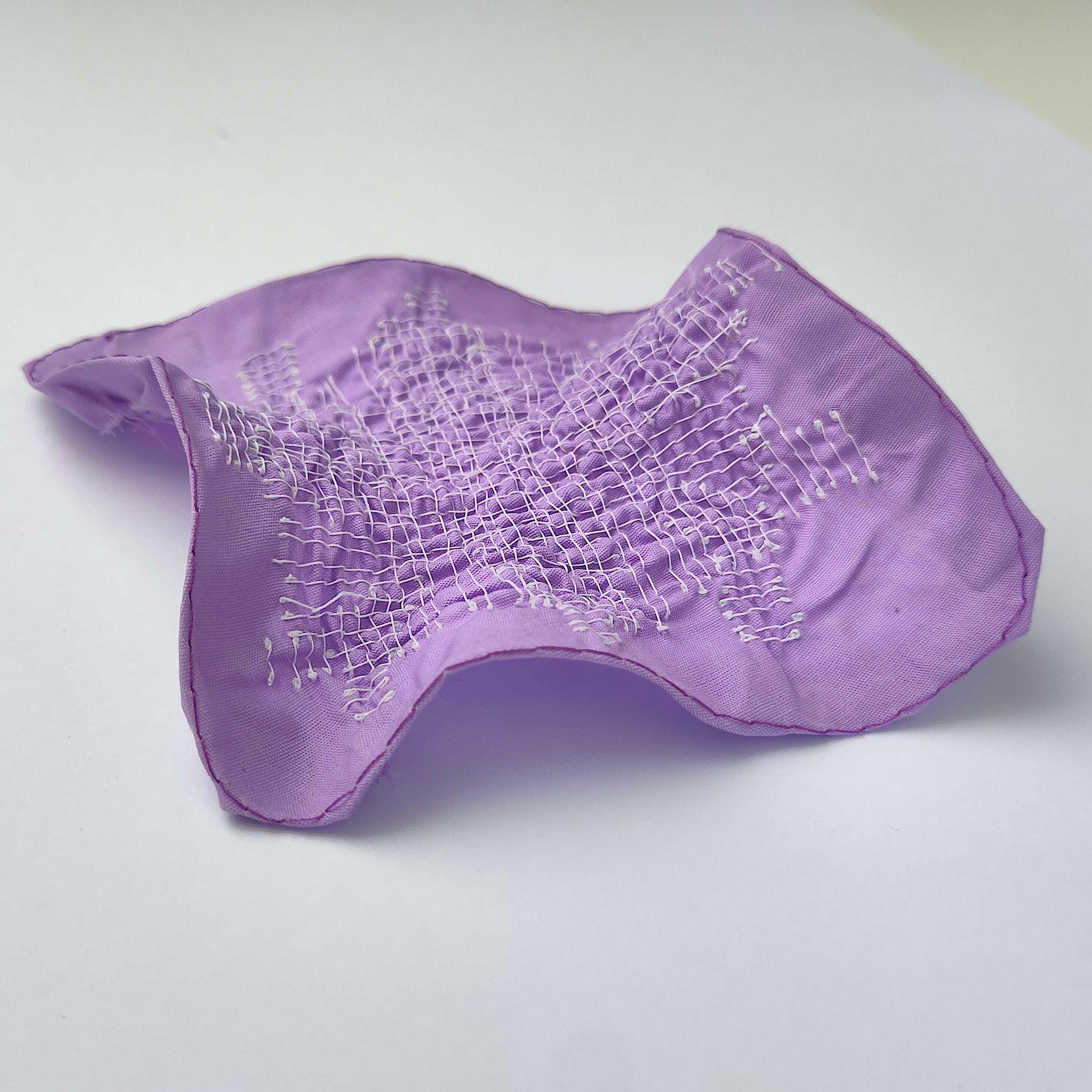 Teaser for Fabricating 3D Shapes by Shrinking-Thread Embroidery